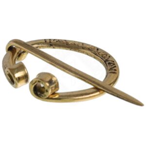 Kleine Messingfibel mit Verzierung